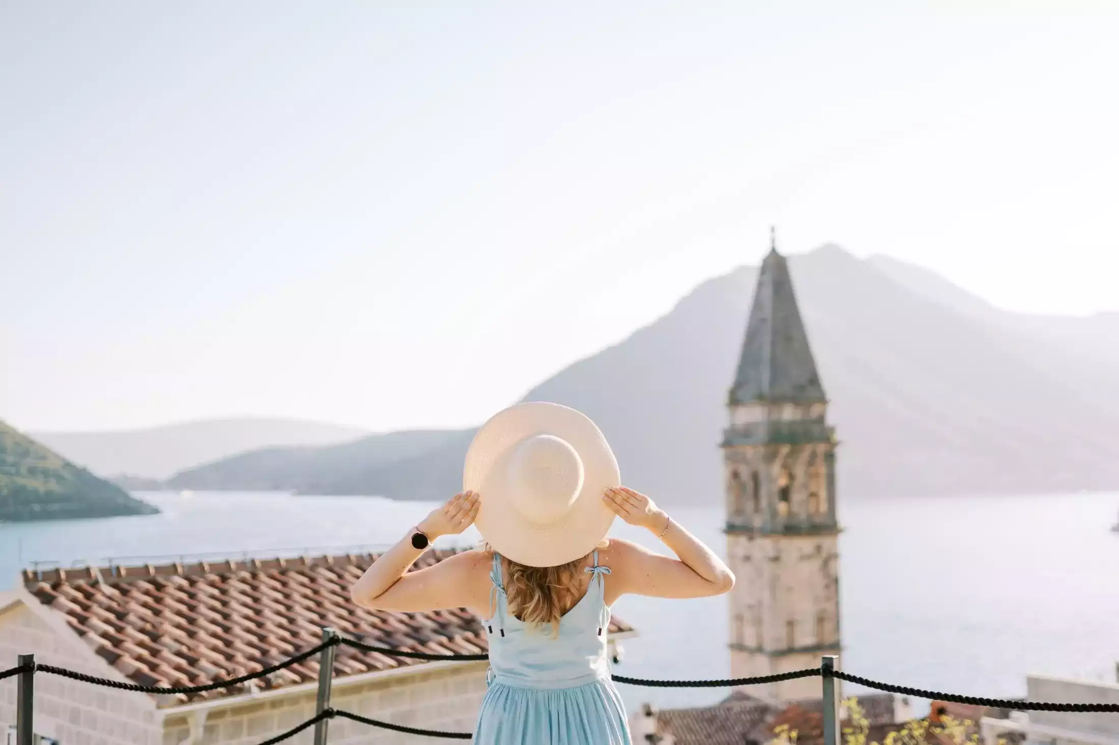 Woman watching Perast from the Hill above 